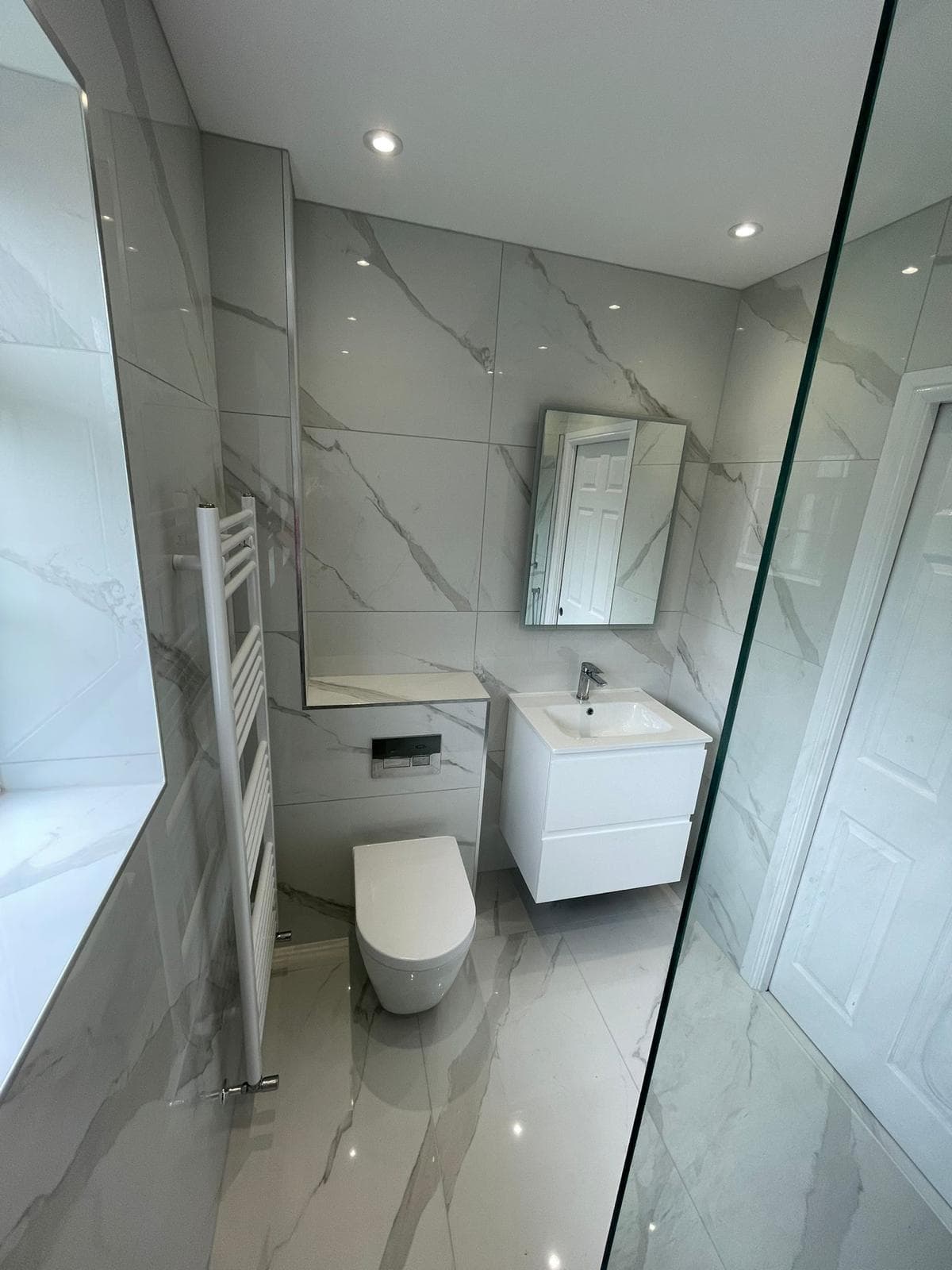 Modern ensuite bathroom installation with premium finishes
